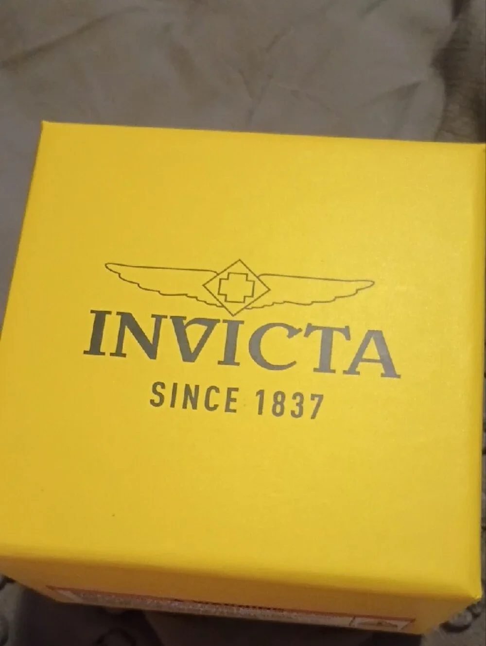 Invicta Gold Tone Case White Strap Skeleton Dial Men’s Watch